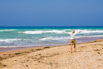 a beutiful woman on the beach in Mediterranean