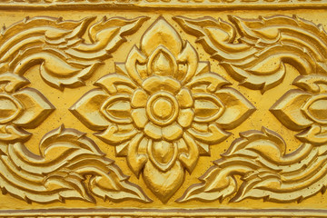 Details of traditional Thai art on the wall of church.