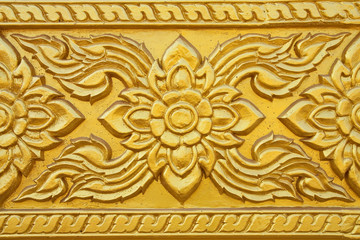 Details of traditional Thai art on the wall of church.