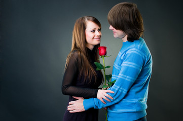 Happy couple with rose