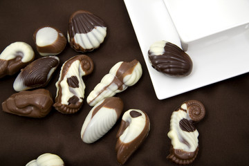 chocolate sweetmeats in form seashell and cup