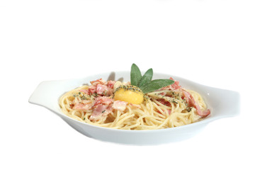 Spaghetti Carbonara with yolk and sage