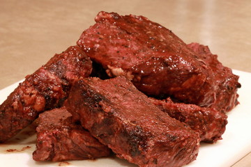 boneless barbecue ribs on cutting board