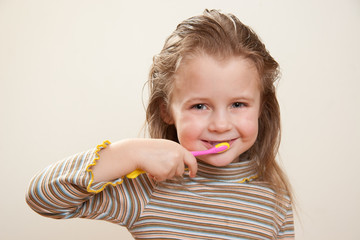 Child with tooth brush