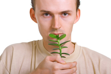 man holding young plant