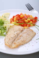 Fish dish - roasted cod with vegetable salad