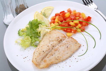Fish dish - roasted cod with vegetable salad
