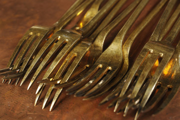 old antique golden forks