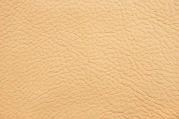Beige leather background.
