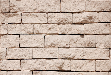 Obraz premium Fragment of rough gravel brick wall
