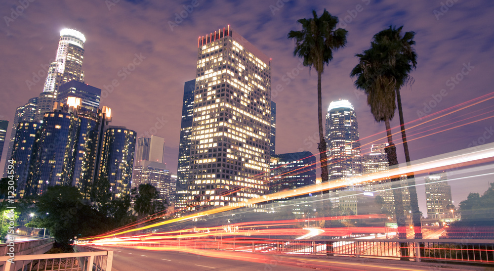 Wall mural Traffic through Los Angeles (traffic seen as light trails)