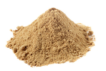 spices - pile of Ginger powder over white