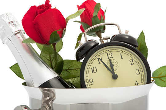 Sektkübel mit Uhr und Rosen