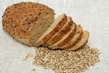 Sliced loaf of bread with sunflower seeds