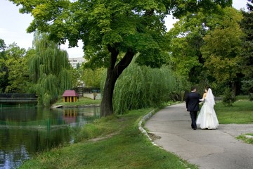Bride and groom in a park