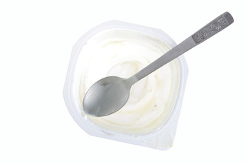 Empty yogurt with spoon