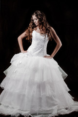 Fototapeta na wymiar Fashion model wearing wedding dress