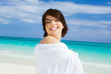 happy woman with white sarong