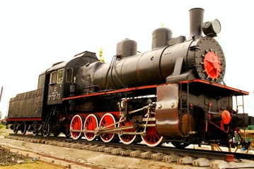 Naklejka premium Steam locomotive standing like monument
