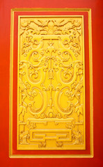 Detail of carving on surface of church door..