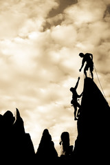 Team of climbers on the summit.