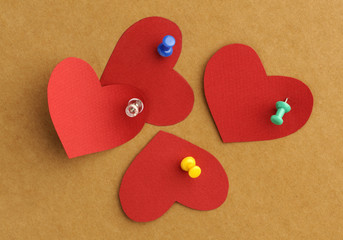 Paper's hearts with  thumbtacks - 12319791