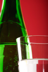 green bottle with glass