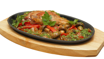 Fried meat with vegetables and mushrooms