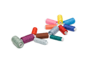 Different colored spools of thread