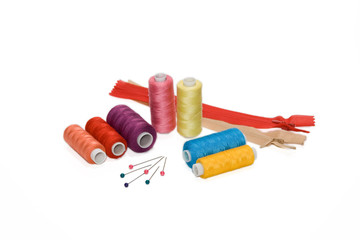 Different threads, zipper and pins