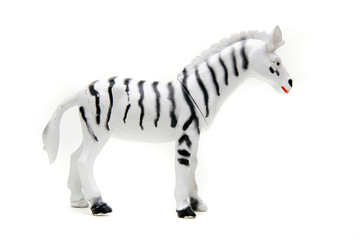 Fototapeta na wymiar toy zebra over white