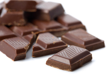 broken pieces of chocolate isolated