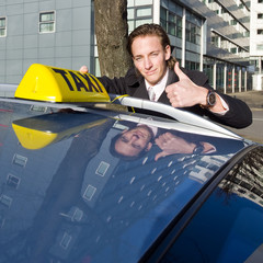 Smiling taxi driver