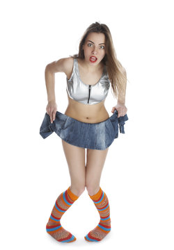 A beautiful young woman in denim skirt