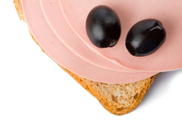 bread with sausage and olives isolated