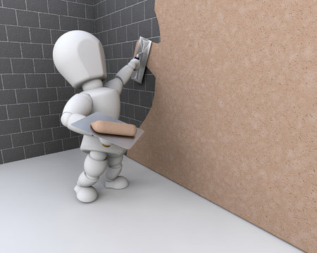 person plastering a  wall