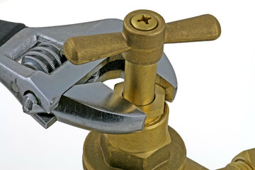 close up adjusting gland packing nut on stop cock © RZ