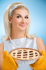 Beautiful woman holding hot italian pie. Retro stylized portrait