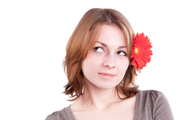 Fototapeta premium isolated portrait of a woman with gerber flower