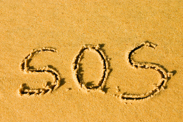 sos dans le sable
