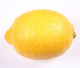 A lemon fruit  in close-up on white backround