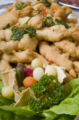 Cucumber,carrot,potato,lettuce  decoration and  chicken fingers