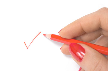 Woman's hand ticking off