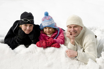 Happy family on winter vacation