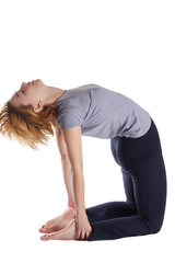 Fototapeta premium Female doing yogatic exericise.