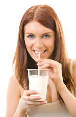 Portrait of young woman drinking milk, isolated