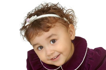 two-year-old girl in purple velvet dress, isolated on white
