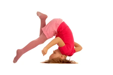 Foto op Plexiglas young girl during somersault © amriphoto.com