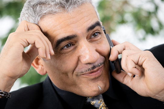 Businessman calling on phone