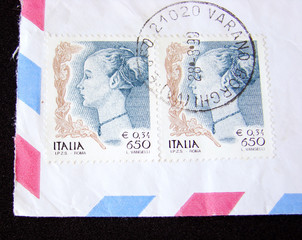 Italy Postage Stamps on a piece of envelope
